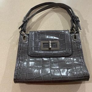 Like new leather purse by Talbots immaculate condition. Purse is 9x11” in size